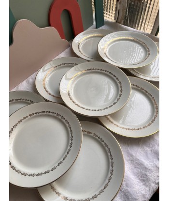 Neuf grandes assiettes en faïence blanche à décor de lierre doré Par le système avancé 